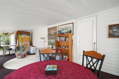 Nestled in the highly sought-after 55+ community of IMPERIAL on Bay Tree Golf Course in Florida - for sale on GolfHomes.com, golf home, golf lot