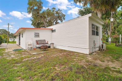 Nestled in the highly sought-after 55+ community of IMPERIAL on Bay Tree Golf Course in Florida - for sale on GolfHomes.com, golf home, golf lot
