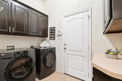 Beautifully situated on a quiet, gated street overlooking Iron on Iron Horse Golf Course in Texas - for sale on GolfHomes.com, golf home, golf lot
