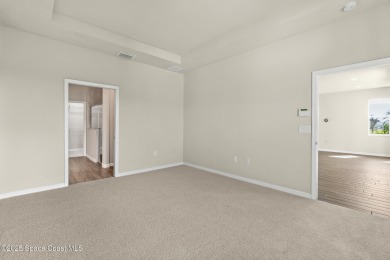 Charming and spacious Loren Cove townhome with oversized on Duran Golf Course in Florida - for sale on GolfHomes.com, golf home, golf lot