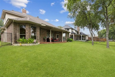 Beautifully situated on a quiet, gated street overlooking Iron on Iron Horse Golf Course in Texas - for sale on GolfHomes.com, golf home, golf lot