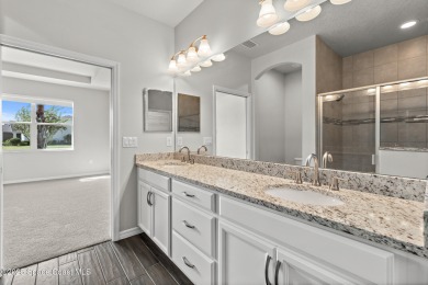 Charming and spacious Loren Cove townhome with oversized on Duran Golf Course in Florida - for sale on GolfHomes.com, golf home, golf lot