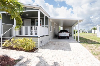 Nestled in the vibrant and sought-after community of Naples on Royal Wood Golf and Country Club in Florida - for sale on GolfHomes.com, golf home, golf lot