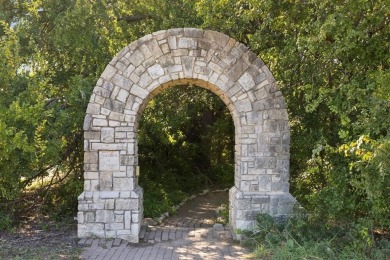 Beautifully situated on a quiet, gated street overlooking Iron on Iron Horse Golf Course in Texas - for sale on GolfHomes.com, golf home, golf lot