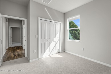 Charming and spacious Loren Cove townhome with oversized on Duran Golf Course in Florida - for sale on GolfHomes.com, golf home, golf lot
