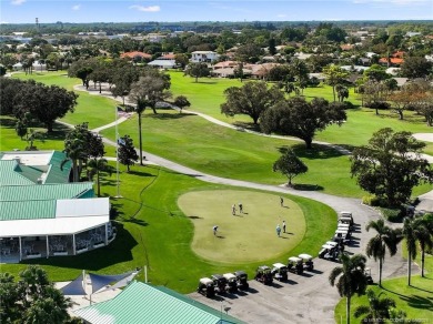 Stunning waterfront top-down remodel in the sought-after Yacht on Yacht and Country Club in Florida - for sale on GolfHomes.com, golf home, golf lot