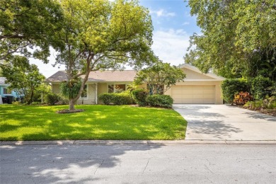 Welcome to this exceptional home in the highly sought-after on The Dunedin Country Club in Florida - for sale on GolfHomes.com, golf home, golf lot