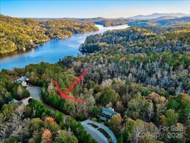 Enjoy stunning views of both Lake Lure and Rumbling Bald on Rumbling Bald Resort on Lake Lure in North Carolina - for sale on GolfHomes.com, golf home, golf lot