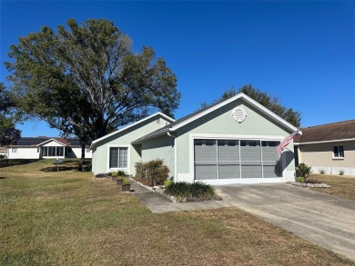 Beautiful 2/2 home in gated 55+ community. High ceilings on Ocala Palms Golf and Country Club in Florida - for sale on GolfHomes.com, golf home, golf lot