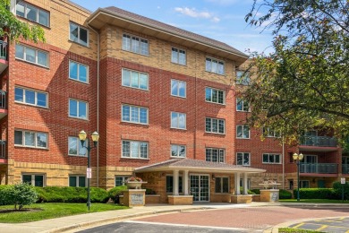 Experience resort-style living in this main floor 2-bed, 2-bath on Old Orchard Country Club in Illinois - for sale on GolfHomes.com, golf home, golf lot