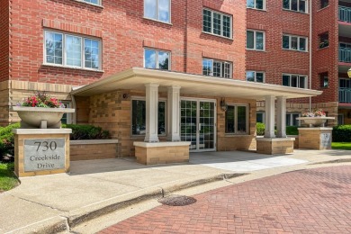 Experience resort-style living in this main floor 2-bed, 2-bath on Old Orchard Country Club in Illinois - for sale on GolfHomes.com, golf home, golf lot