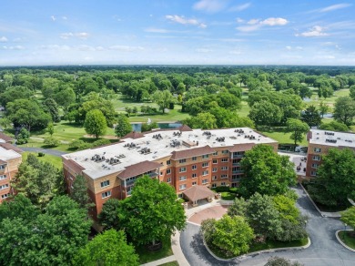 Experience resort-style living in this main floor 2-bed, 2-bath on Old Orchard Country Club in Illinois - for sale on GolfHomes.com, golf home, golf lot