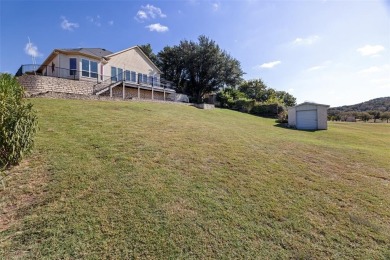 Welcome to 9304 Ravenswood Road, an exceptional RIVERFRONT on Pecan Plantation Country Club in Texas - for sale on GolfHomes.com, golf home, golf lot