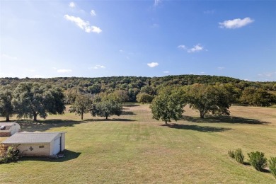 Welcome to 9304 Ravenswood Road, an exceptional RIVERFRONT on Pecan Plantation Country Club in Texas - for sale on GolfHomes.com, golf home, golf lot