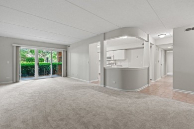 Experience resort-style living in this main floor 2-bed, 2-bath on Old Orchard Country Club in Illinois - for sale on GolfHomes.com, golf home, golf lot