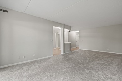 Experience resort-style living in this main floor 2-bed, 2-bath on Old Orchard Country Club in Illinois - for sale on GolfHomes.com, golf home, golf lot