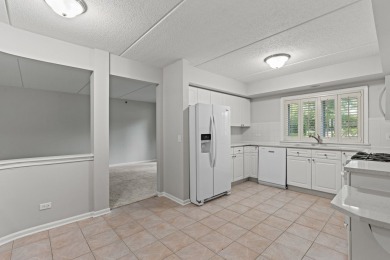 Experience resort-style living in this main floor 2-bed, 2-bath on Old Orchard Country Club in Illinois - for sale on GolfHomes.com, golf home, golf lot