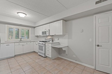 Experience resort-style living in this main floor 2-bed, 2-bath on Old Orchard Country Club in Illinois - for sale on GolfHomes.com, golf home, golf lot