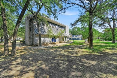 Large family home on beautiful, secluded, and heavily treed lot on Lake Kiowa Golf Course in Texas - for sale on GolfHomes.com, golf home, golf lot