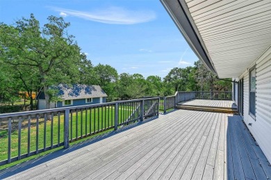 Large family home on beautiful, secluded, and heavily treed lot on Lake Kiowa Golf Course in Texas - for sale on GolfHomes.com, golf home, golf lot