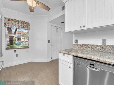 Bright & Clean first-floor 2-bedroom, 1.5-bathroom Waterfront on Flamingo Lakes Country Club in Florida - for sale on GolfHomes.com, golf home, golf lot