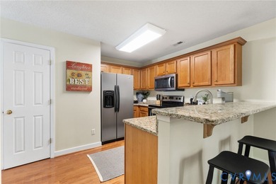 This stunning END-UNIT home rests on a quiet cul-de-sac in the on Stonehenge Golf and Country Club in Virginia - for sale on GolfHomes.com, golf home, golf lot