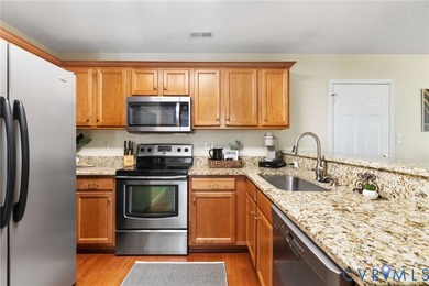 This stunning END-UNIT home rests on a quiet cul-de-sac in the on Stonehenge Golf and Country Club in Virginia - for sale on GolfHomes.com, golf home, golf lot