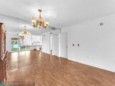 Bright & Clean first-floor 2-bedroom, 1.5-bathroom Waterfront on Flamingo Lakes Country Club in Florida - for sale on GolfHomes.com, golf home, golf lot