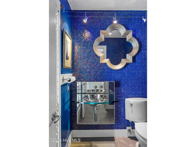 Along Cape Fear Trail on Bald Head Island, this architecturally on Bald Head Island Golf Club in North Carolina - for sale on GolfHomes.com, golf home, golf lot