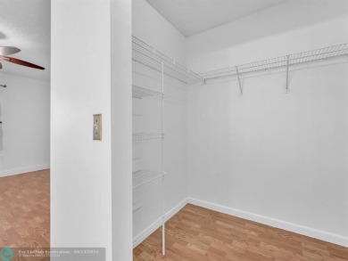 Bright & Clean first-floor 2-bedroom, 1.5-bathroom Waterfront on Flamingo Lakes Country Club in Florida - for sale on GolfHomes.com, golf home, golf lot