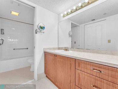 Bright & Clean first-floor 2-bedroom, 1.5-bathroom Waterfront on Flamingo Lakes Country Club in Florida - for sale on GolfHomes.com, golf home, golf lot