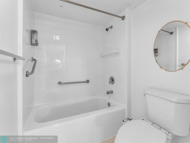 Bright & Clean first-floor 2-bedroom, 1.5-bathroom Waterfront on Flamingo Lakes Country Club in Florida - for sale on GolfHomes.com, golf home, golf lot