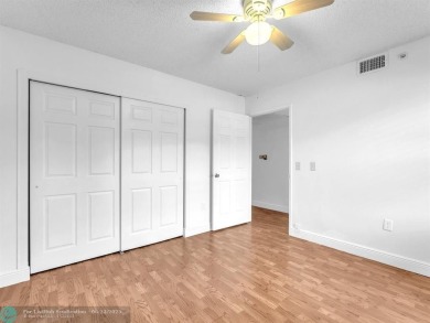 Bright & Clean first-floor 2-bedroom, 1.5-bathroom Waterfront on Flamingo Lakes Country Club in Florida - for sale on GolfHomes.com, golf home, golf lot