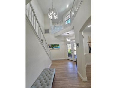 Welcome to your own personal paradise; a stunning 6-bedroom on River Strand Golf and Country Club At Heritage Harbour  in Florida - for sale on GolfHomes.com, golf home, golf lot