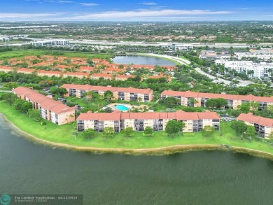 Bright & Clean first-floor 2-bedroom, 1.5-bathroom Waterfront on Flamingo Lakes Country Club in Florida - for sale on GolfHomes.com, golf home, golf lot