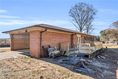 Spacious, three bedroom, two and half bath brick ranch home with on Falcons Lair Golf Club in South Carolina - for sale on GolfHomes.com, golf home, golf lot