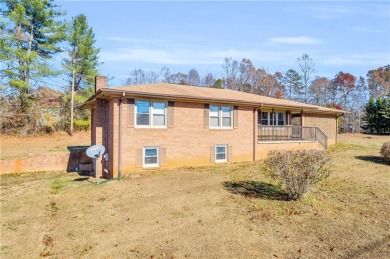 Spacious, three bedroom, two and half bath brick ranch home with on Falcons Lair Golf Club in South Carolina - for sale on GolfHomes.com, golf home, golf lot