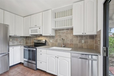 Stylishly Renovated 2-Bedroom, 2-Bath Villa in The Meadows - on The Meadows Golf and Country Club in Florida - for sale on GolfHomes.com, golf home, golf lot