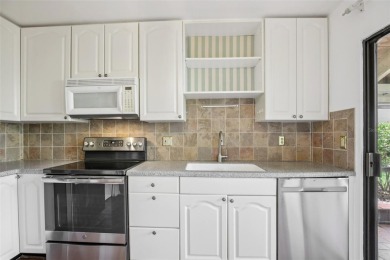 Stylishly Renovated 2-Bedroom, 2-Bath Villa in The Meadows - on The Meadows Golf and Country Club in Florida - for sale on GolfHomes.com, golf home, golf lot