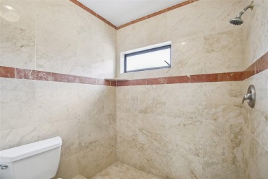 Stylishly Renovated 2-Bedroom, 2-Bath Villa in The Meadows - on The Meadows Golf and Country Club in Florida - for sale on GolfHomes.com, golf home, golf lot