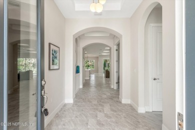 Welcome to refined coastal living in this beautifully crafted on Grand Haven Golf Club in Florida - for sale on GolfHomes.com, golf home, golf lot