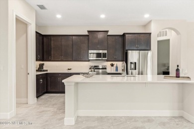 Welcome to refined coastal living in this beautifully crafted on Grand Haven Golf Club in Florida - for sale on GolfHomes.com, golf home, golf lot