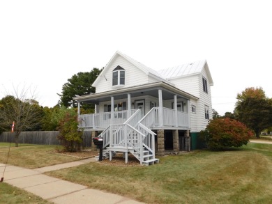 Sprawling turn of the century home located across from the golf on Oconto Golf Club in Wisconsin - for sale on GolfHomes.com, golf home, golf lot