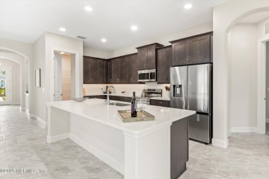 Welcome to refined coastal living in this beautifully crafted on Grand Haven Golf Club in Florida - for sale on GolfHomes.com, golf home, golf lot