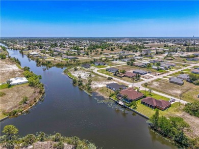 Welcome to your dream waterfront lifestyle in Cape Coral! This on Del Tura Golf and Country Club in Florida - for sale on GolfHomes.com, golf home, golf lot
