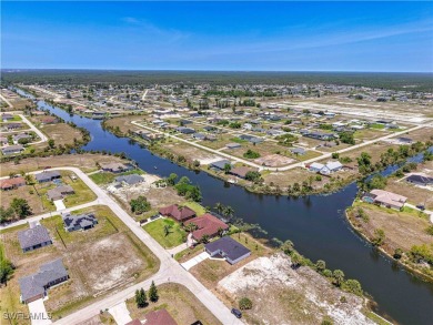 Welcome to your dream waterfront lifestyle in Cape Coral! This on Del Tura Golf and Country Club in Florida - for sale on GolfHomes.com, golf home, golf lot