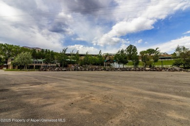 Coined ''America's Most Trusted Horseman'', John Lyons and his on Battlement Mesa Golf Course in Colorado - for sale on GolfHomes.com, golf home, golf lot