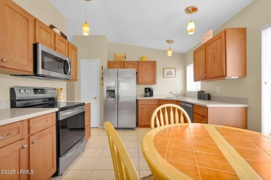Discover effortless living in this charming Clayton model patio on Okatie Creek Golf Club in South Carolina - for sale on GolfHomes.com, golf home, golf lot