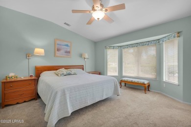 Discover effortless living in this charming Clayton model patio on Okatie Creek Golf Club in South Carolina - for sale on GolfHomes.com, golf home, golf lot