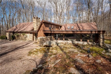 Amazing golf course views from this rustic contemporary home on Nemacolin Woodlands Resort and Spa in Pennsylvania - for sale on GolfHomes.com, golf home, golf lot